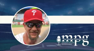 Former MLB Player Mickey Morandini wearing a Phillies cap and sunglasses.