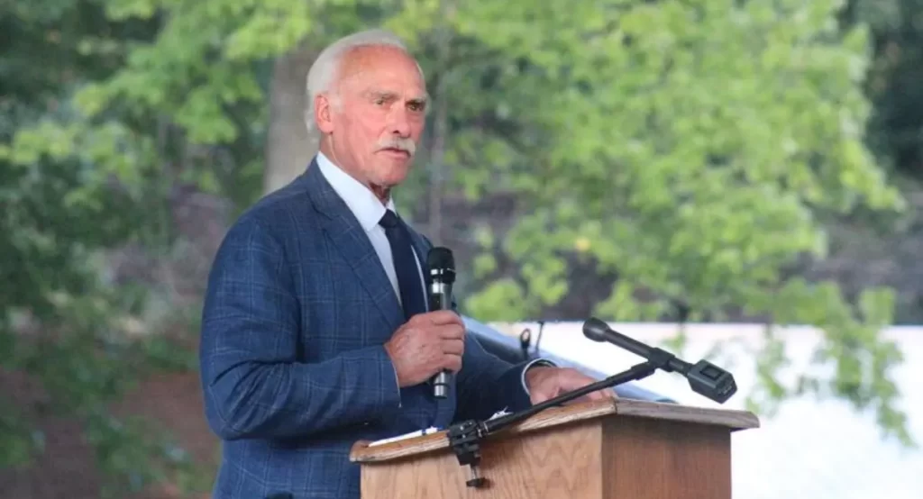 Former NFL player and Military Keynote Speaker Rocky Bleier giving a speech.