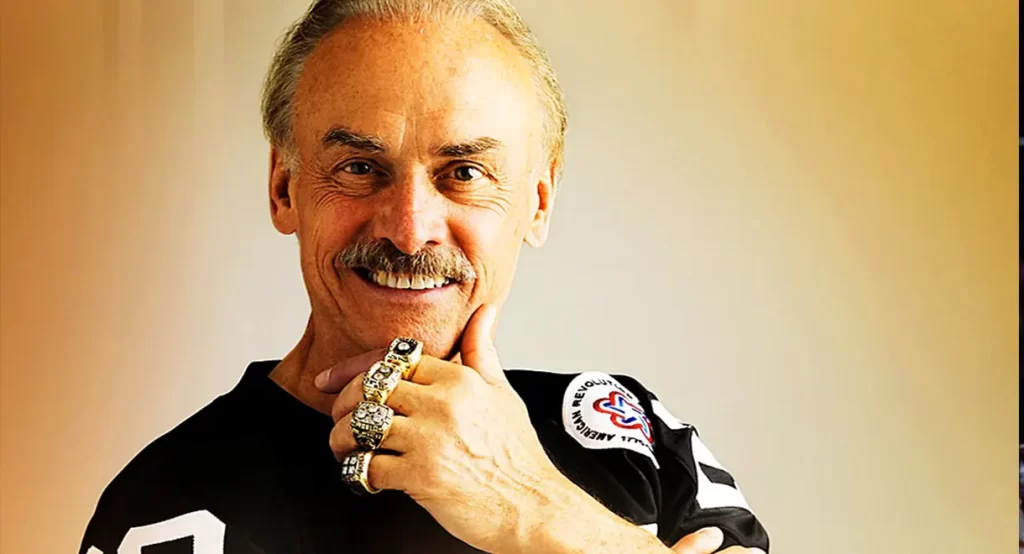 Sports speaker Rocky Bleier wearing his Super Bowl rings.