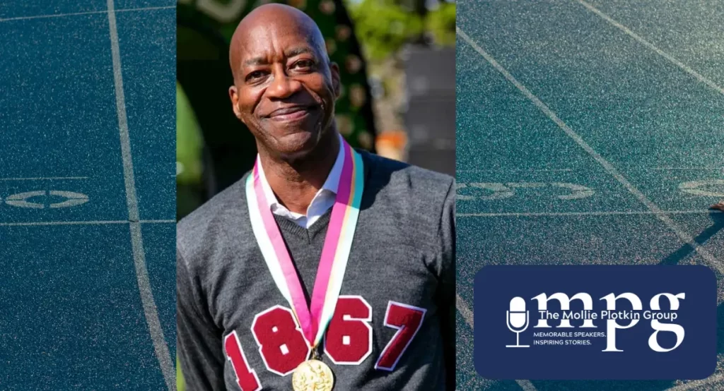Edwin Moses in front of a track field.